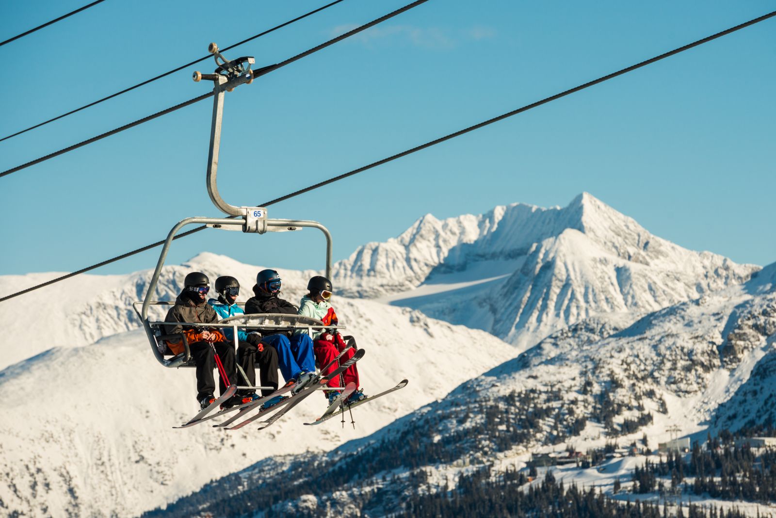 Skiers on the 2017 Emerald Express Chairlift
