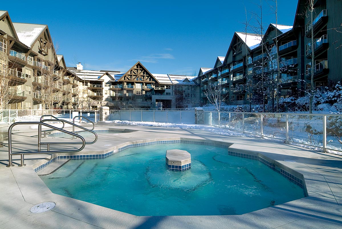 Aspens condos hot tub on a snowy winter day