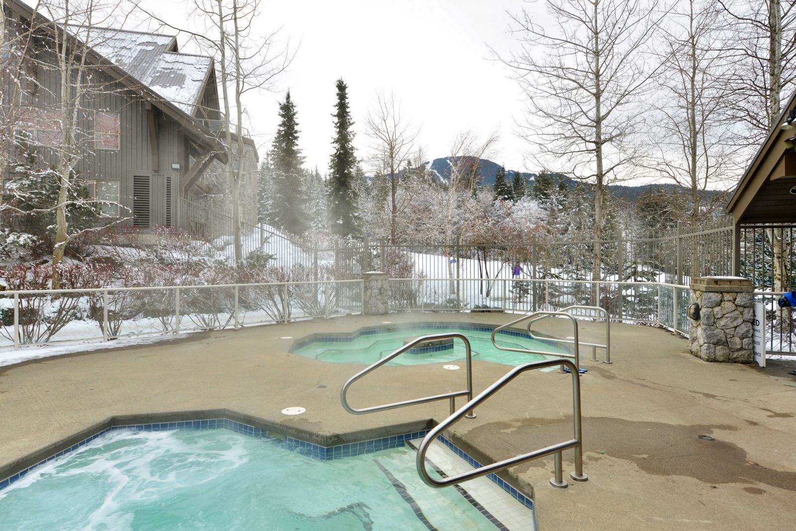 Aspens Lodge hot tub with views of Blackcomb