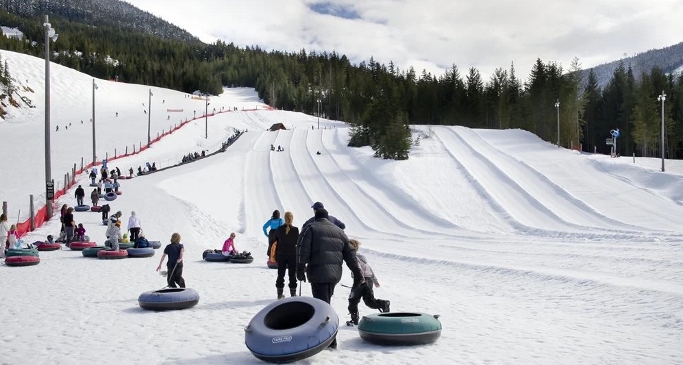 Family enjoying Whistler tube park
