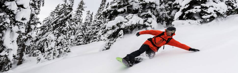 A Snowboarder Enjoying Fresh Lines