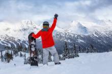 Snowboarder at Whistler on a powder day Snowboarder at Whistler on a powder day